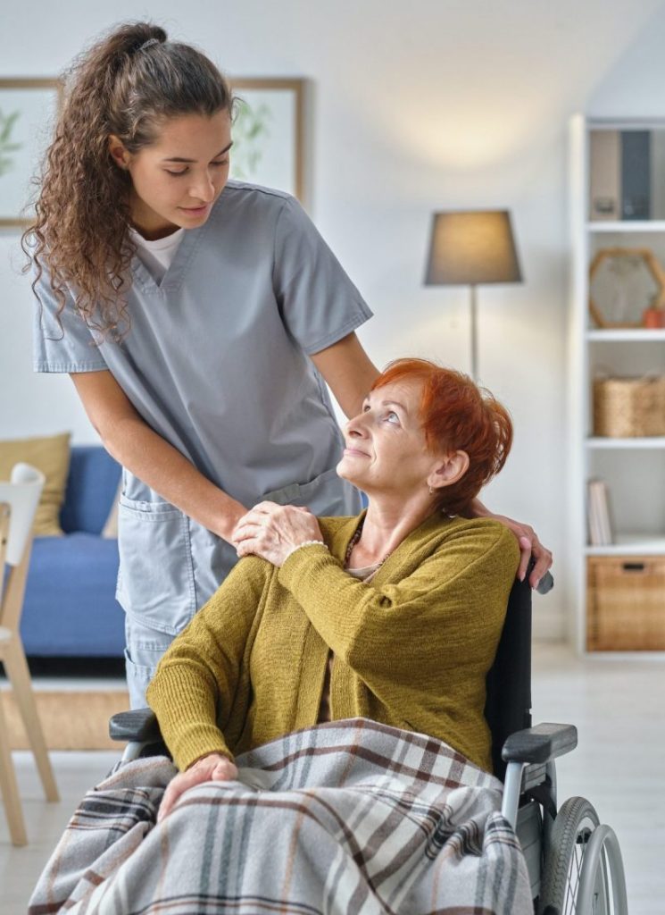 Home care nurse taking care about senior woman