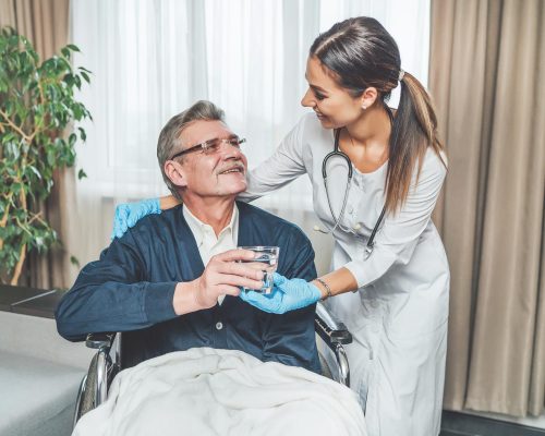 Nurse or Doctor taking care of a elder person